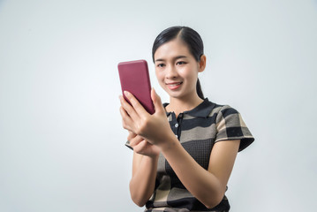 Young asian woman using phone, facial recognition system, biometrics concepts.