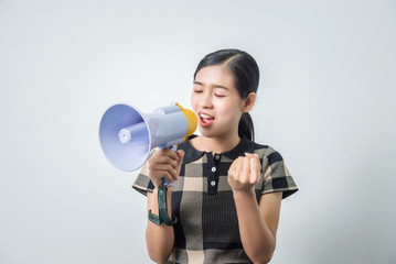 Young beautiful asian woman holding loudspeaker, black hair.