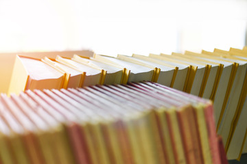 Education learning concept - books on bookshelf in the library bookshelves in school study class...