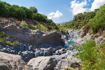 Alcantara Gorge and Alcantara river Park in Sicily island,  Italy. Beautiful mountain landscape.