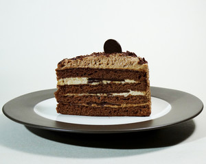 Delicious chocolate sponge cake layered with chocolate cream and finished with chocolate flakes and chocolate coin.