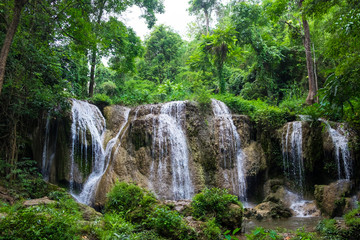 Fototapeta na wymiar Tran Sawan Waterfall, Phayao Province Thailand. Soft water of the stream in the natural park, Beautiful waterfall in rain forest