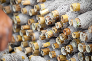 Group of threads made of cotton, textile industry in Guatemala, handmade textile of cotton, source of economy and employment.