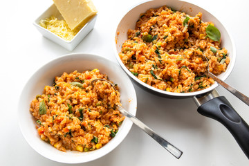 Risotto with tomatoes, fresh herbs and parmesan cheese