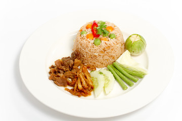 Thai food Shrimp paste sauce with crispy fried fish and sweet pork white dish isolated