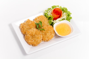 Thai food fried shrimp cake white dish isolated