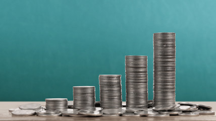 Graph stock market. Pile of Coins on stacks