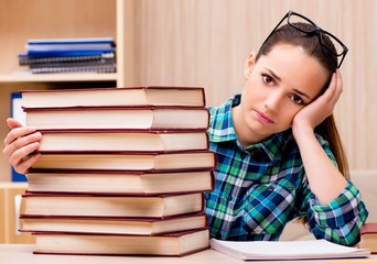 Young female student preparing for exams