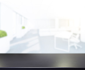 Fototapeta premium Table Top And Blur Office Of Background