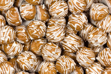 Custard cookies with white chocolate icing. Lots of cookies