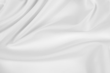 Naklejka premium Biała tkanina tekstura tło. Tkanina miękka fala. Zagniecenia z satyny, jedwabiu i bawełny.