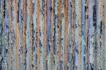 塗装が剥がれた金属の壁