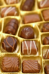 chocolate candy set close-up.assorted chocolate sweets. candies set in an open box. .sweet dessert closeup.gift box.Details sweets praline chocolate sweets.