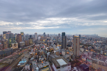 Naklejka na ściany i meble Skyscraper of Osaka City, View of Umeda Skyline after Sunset