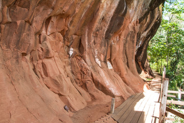 stone wall with old wooden path way