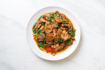 stir-fried crispy pork belly and basil