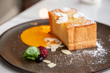 Toast with salted egg sauce and almond