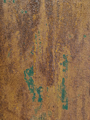 close up green brown rust texture on metal. Background  grunge and raw surface.