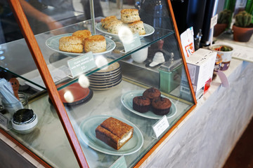 Interior design and decoration of local coffee bar ,book store ,bed and breakfast and bakery shop decorated in industrial loft and minimal style