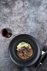 Veal beef stroganoff with oyster mushrooms and creamy mashed potato ? comfort food in a restaurant