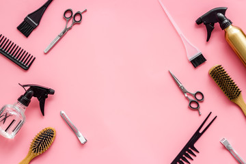 Beauty saloon concept. Hairdresser accessories pattern on pink background top-down frame copy space