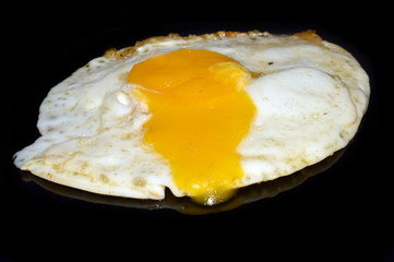 egg isolated on black background