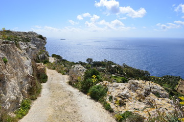 Fototapeta na wymiar A narrow cliff path on the Dingli cliffs in Malta