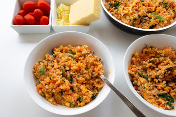 Risotto with tomatoes, fresh herbs and parmesan cheese