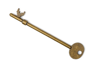 old brass key against a white background