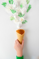 White easter eggs with silver pattern on white