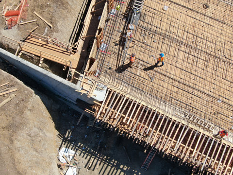 Aerial View Of Bridge Construction Crossing The Highway, California, USA