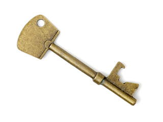 old brass key against a white background