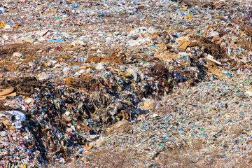 Aerial view of city garbage dump. Pile of plastic trash, food waste on landfill. Environmental pollution concept