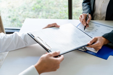 Job interview, Corporate business Employer or recruiter around the table during interviewing recruitment process concept.