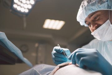 portrait of a doctor on the background of medical equipment