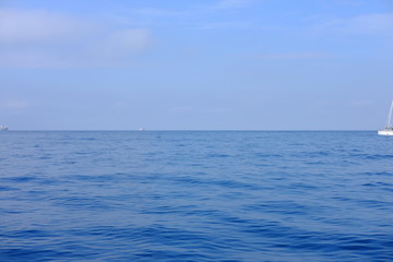 Obraz premium The blue sea and large clouds