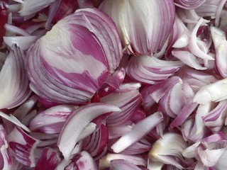 Raw chopped onions background. closeup image of fresh cutted onion