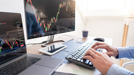 Working business man, team of broker or traders talking about forex on multiple computer screens of stock market invest trading financial graph charts data analysis.