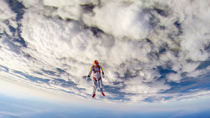 Celebration. A man makes the first parachute jump. The first step into the abyss.