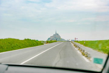 View of Mont Saint Michel in Normandy from inside the car.