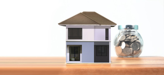 House Model on wooden there space.Home,Housing and Real Estate concept ,business idea