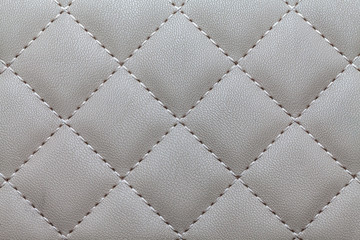 Fototapeta premium Texture of a beautiful, club sofa in gray for background