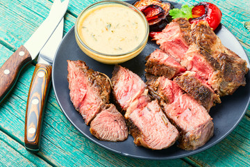 Roast beef with table knife