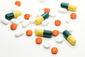 prescription pills on white background closeup