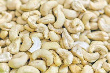 Background and texture of peeled cashew nuts.