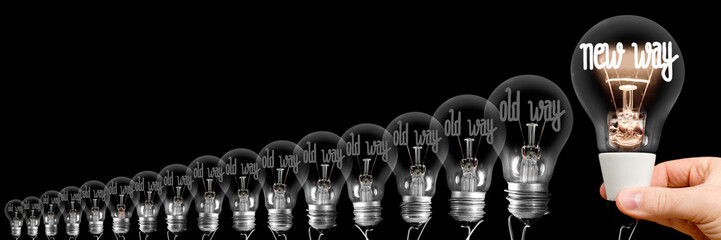 Light Bulbs with New and Old Way Concept