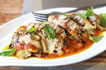 Cheese gratinated baked eggplant with Spanish Tomato Sauce