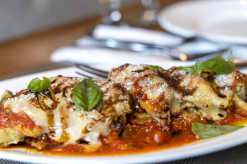 Cheese gratinated baked eggplant with Spanish Tomato Sauce