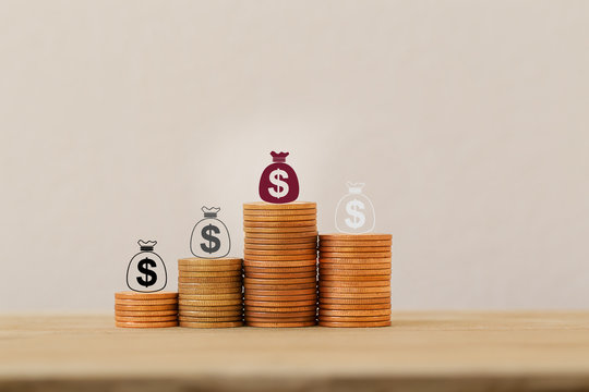 Sustainable fund concepts: Arrange icon US dollar bags on rising coins. Investment in assets from personal income for long-term financial growth. Time value of money, wealth creation