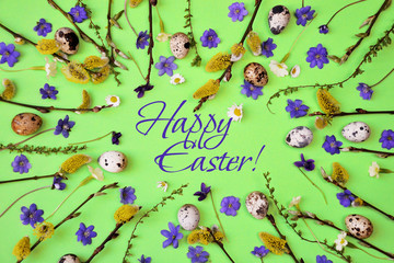 Anemones and willow flowers with eggs on blue background. Easter consept of banner or greeting card